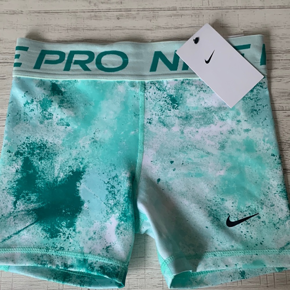 Nike Pro three inch length, size medium kids